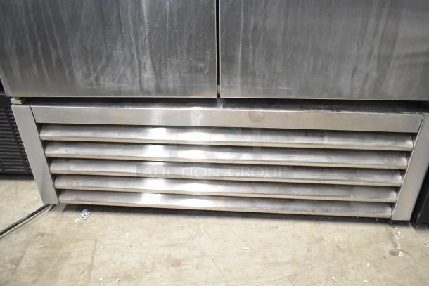 True T-35 stainless steel commercial cooler, 2 doors, poly-coated racks, commercial casters, 115V, 1 phase.