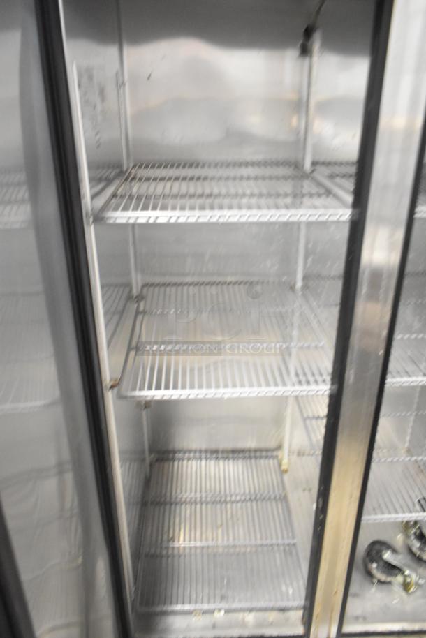 True T-35 stainless steel commercial cooler, 2-door, poly-coated racks, on casters, 115V, 1 phase.