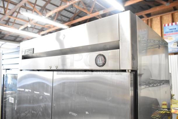 True T-35 Stainless Steel 2 Door Commercial Cooler with poly coated racks, commercial casters, and thermometer. Model T-35.