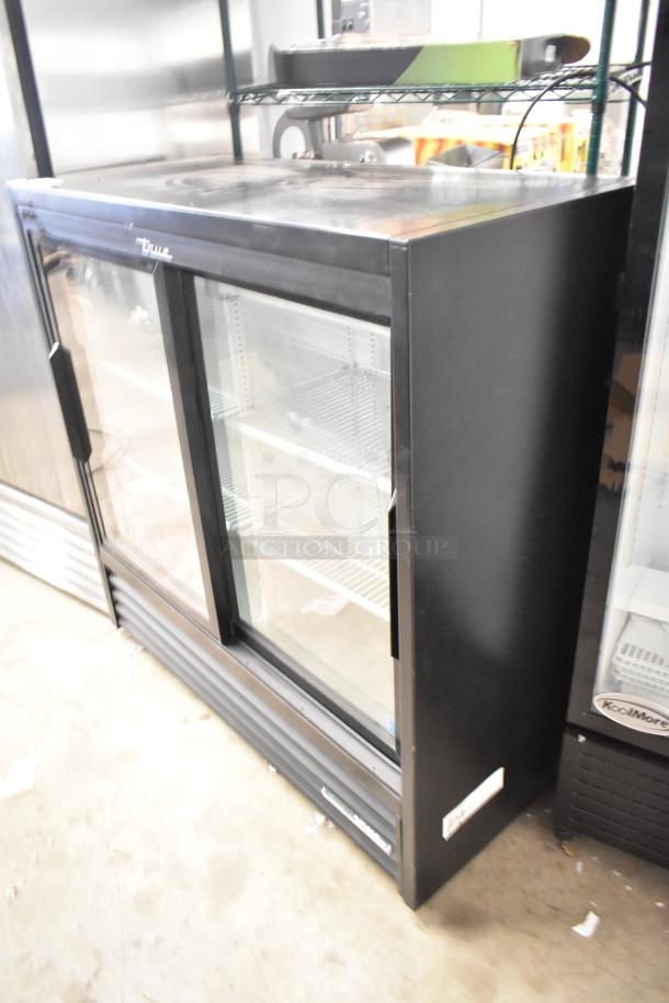 2020 True GDM-41SL-48-HC-LD 2-door cooler, black metal, poly-coated racks, 115V, 1 phase, excellent condition.