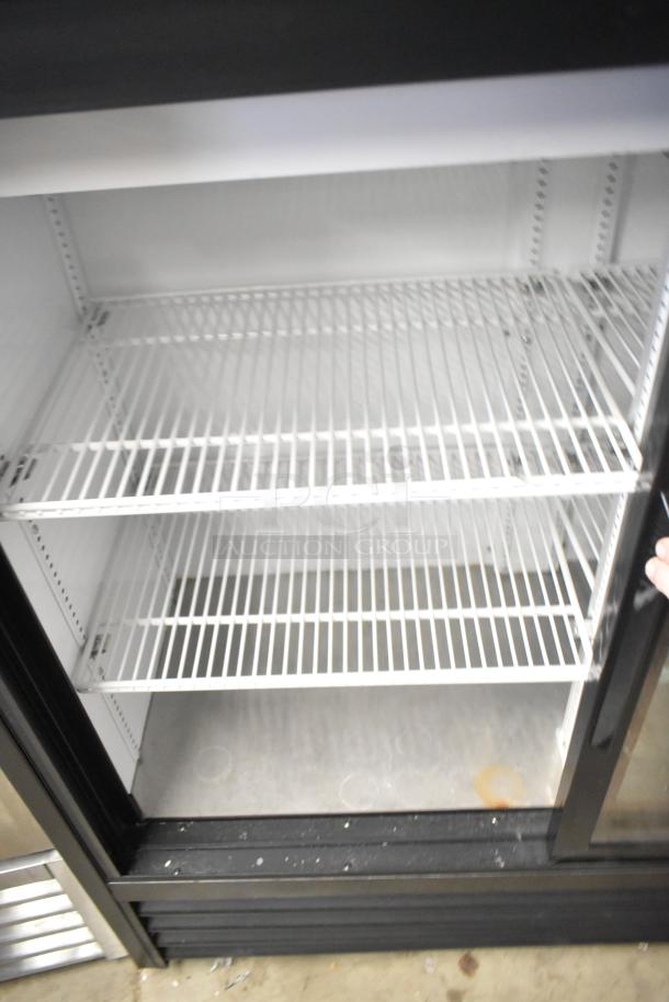 2020 True GDM-41SL-48-HC-LD cooler, metal, 2-door, poly coated racks, 115 volts, 1 phase, great condition.