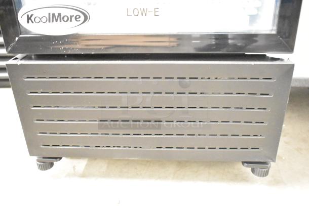 KoolMore KM-MDR-1GD-10C cooler with poly-coated racks, commercial casters, and KoolMore branding. Single door, 115V, 1 phase.