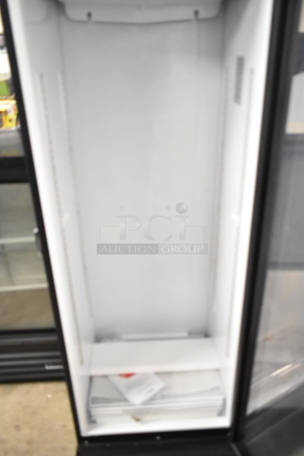 KoolMore KM-MDR-1GD-10C commercial cooler; single glass door, poly coated racks, on casters. 115V, 1 phase, clean interior.