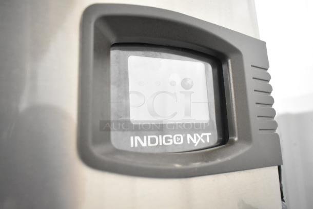 2024 Manitowoc Indigo NXT ice machine, stainless steel, 470 lb capacity, on ice bin. Features Indigo NXT display.