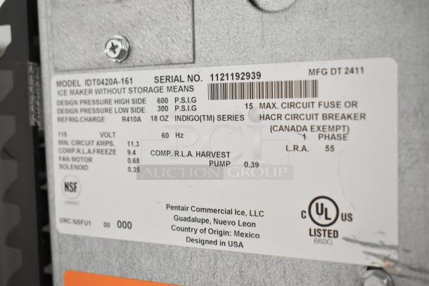 2024 Manitowoc IDT0420A-161 Indigo NXT stainless steel commercial ice machine nameplate showing key specifications.
