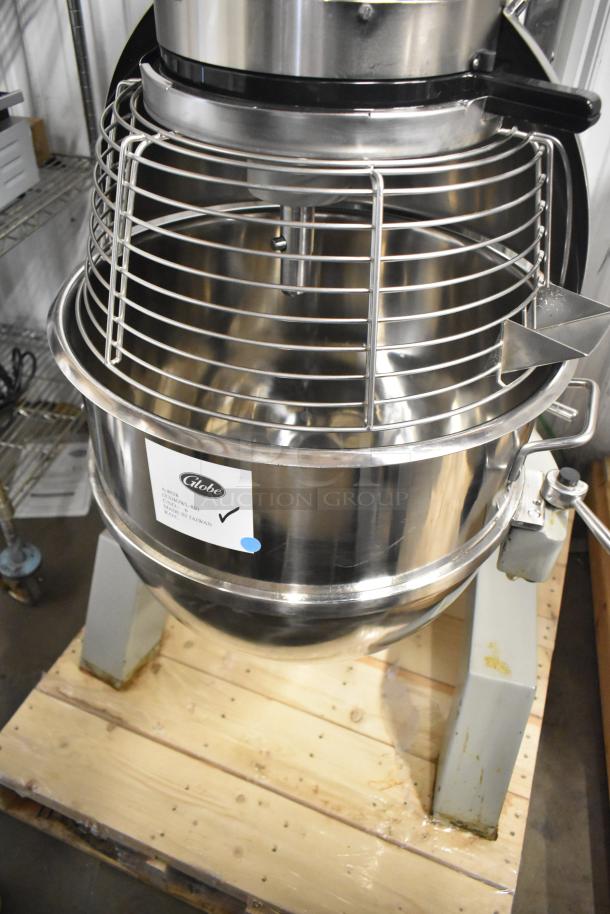 Brand new Globe SP80 80-quart planetary dough mixer with bowl and guard, metal, 220V, 3-phase, labeled, floor model.