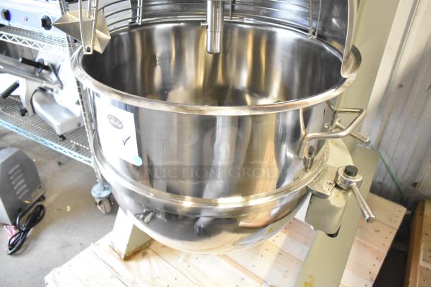 Brand new Globe SP80 80-quart planetary dough mixer with mixing bowl, bowl guard, 220V, 3-phase, stainless steel finish.