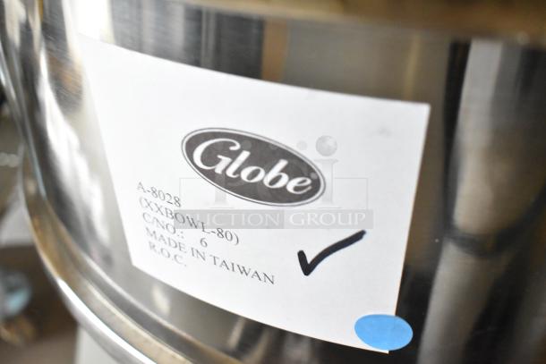 Brand new Globe SP80 metal commercial 80-quart dough mixer with mixing bowl and guard. Label shows model and origin.
