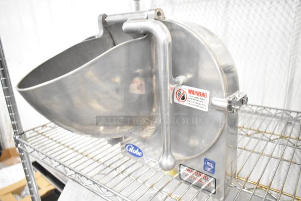 BRAND NEW Globe metal commercial pelican head with shredding blade, stainless steel, safety labels visible, NSF certified.