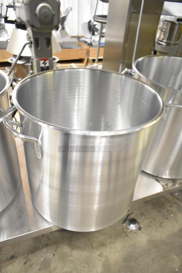 Three brand new Vollrath stainless steel stock pots, featuring a durable design and large capacity.