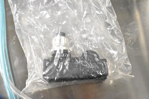 Sealed package with new coil and thermostatic control, showcasing part of five-brand new item set.