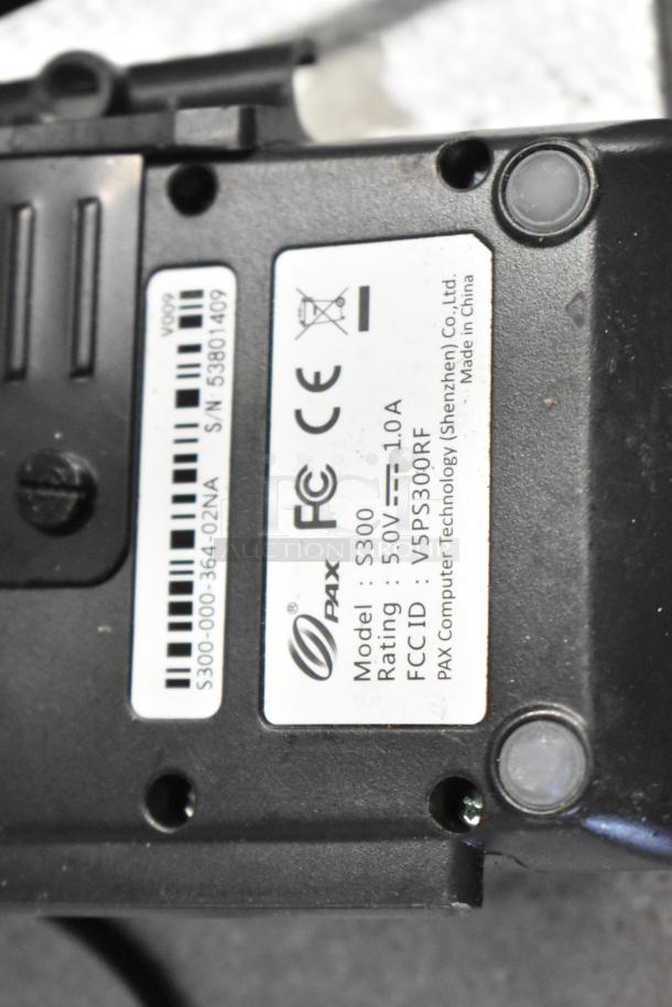 PAX S300 credit card reader, model S300, CE and FCC certified, 5V - 1.0A rating, compact design, made in China.