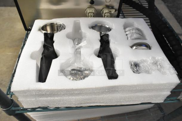 La Marzocco Modbar Espresso AV System components in foam packaging, brand new condition, includes taps and handles.