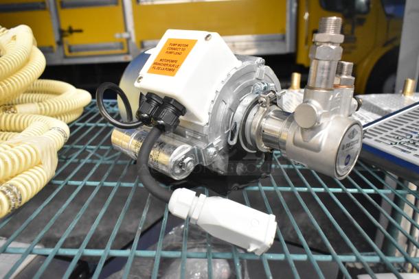 Brand new La Marzocco Modbar Espresso AV System, model MR. 10 EB, shown with metal components and wiring. Tags indicate pump motor connection.