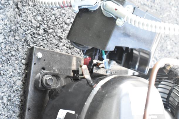 Brand new Copeland M7JP-H021-IAA-072 compressor, 115V, 1 phase. Includes wiring and mounting hardware.