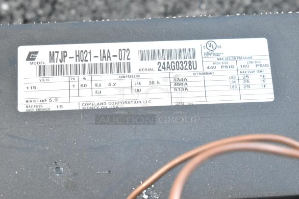 Brand new Copeland M7JP-H021-IAA-072 compressor tag. 115V, 1-phase, 4.2 RLA, 30.5 LRA. Max pressure 440 PSIG. Serial 24AG0328U.