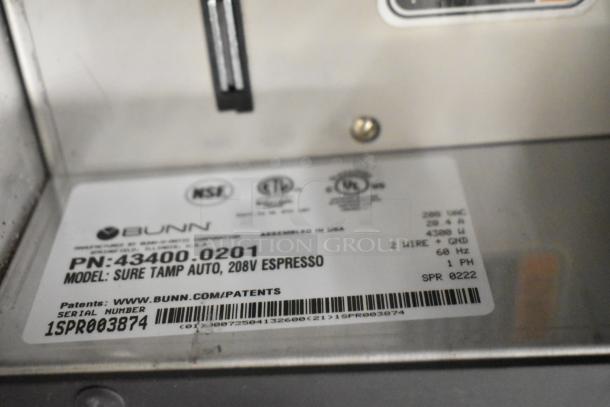 Label on a Bunn SURE TAMP AUTO espresso machine, showing model, serial number, and specifications for 208V operation.