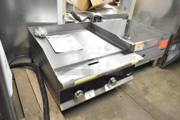 Brand new Vollrath 922GGMDM24 stainless steel 24" countertop griddle. Medium-duty, manual controls, 56,000 BTU. Minor scratches.