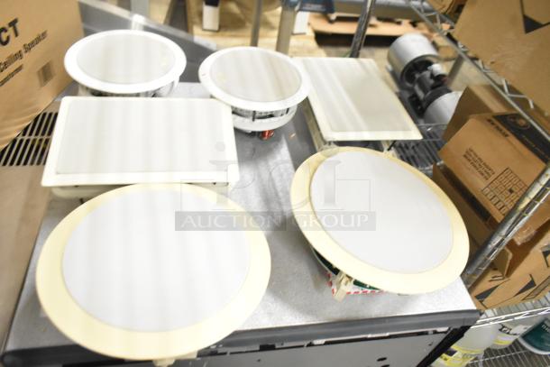 6 in-wall loudspeakers, Control 126WT, new condition, white grills, various shapes, original packaging.