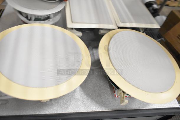 6 In Wall Loudspeakers, model 126WT, set of 6. Round white grilles, ivory frames, in good condition.