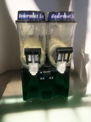 Taylor 340 frozen beverage machine in superb condition, dual dispensers, tested working, 208/230V. "Gourmet Ice" labels.