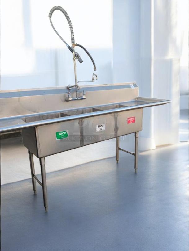 Stainless steel 3-compartment commercial sink with pre-rinse sprayer, prime condition, fully tested and working, labeled wash, rinse, sanitize.