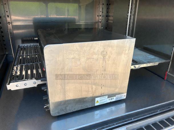 Omcan 41" electric countertop conveyor pizza oven, model 11387, in excellent condition, 240v/1ph, tested and working.