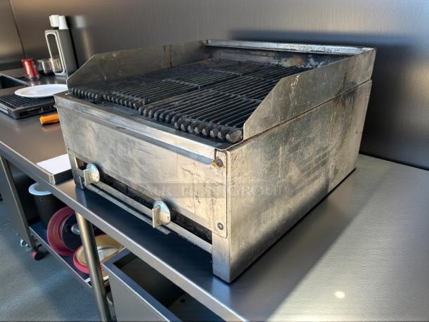 Stratus 24" countertop gas griddle in great condition, tested and working, with visible control knobs, stainless steel finish.