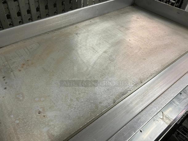 Jade Range 48" gas griddle, model JGT-2448, with 1" steel plate. Excellent condition, thermostatic controls, natural gas.