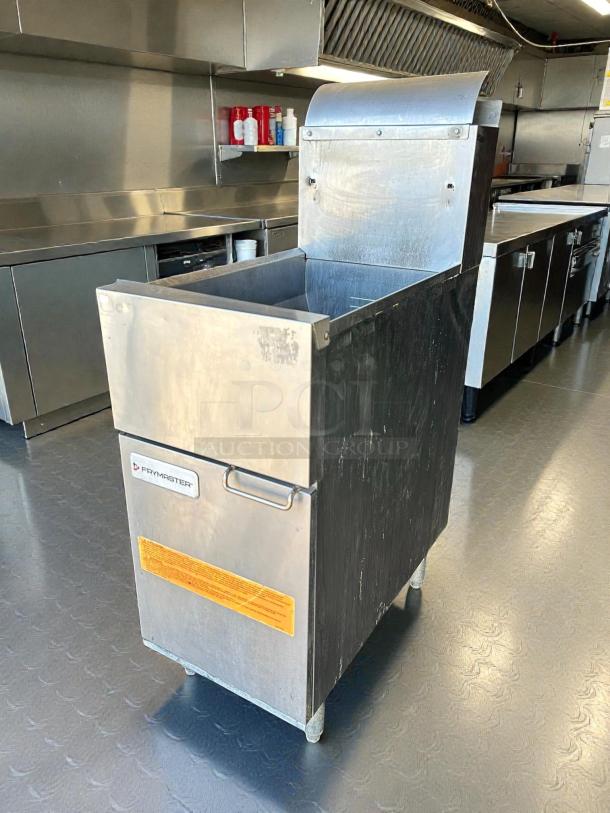 Frymaster ESG35T 35 lb. propane floor fryer in great condition, stainless steel, tested and working, with visible brand label.