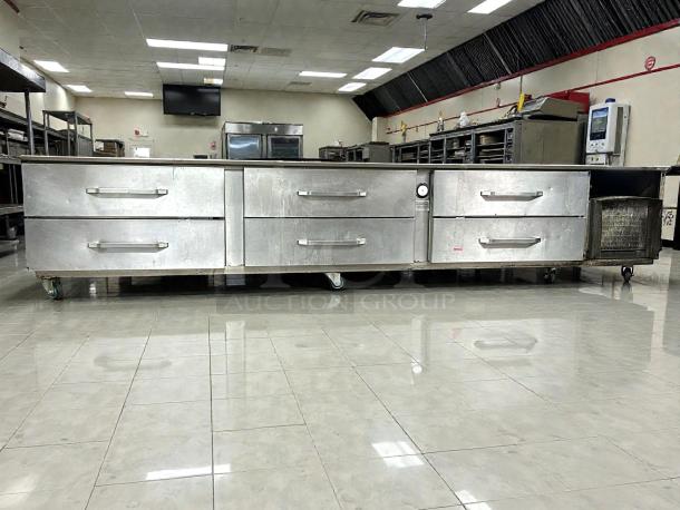 Randell 20105SC refrigerated equipment stand with multiple drawers, stainless steel, on casters, tested and working.