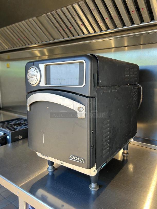 TurboChef Sota high-speed microwave/convection oven, model I1, 208-240v, tested, working, black finish, visible Sota logo.