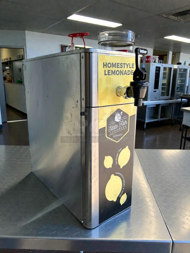 Newco FPM-1 Tea Front Load Post Mix Dispenser in great condition, labeled for Homestyle Lemonade, tested and working.