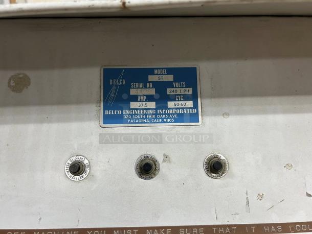 Belco model ST serial 4428 shrink tunnel label, 220V, single-phase, tested condition. Features reset, circuit breaker controls.