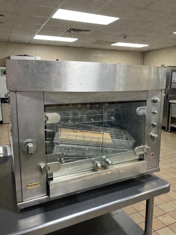 Rotisol USA GF975-2G-SS gas rotisserie, features 2 spits, 6 bird capacity. Tested, working, natural gas, stainless steel.