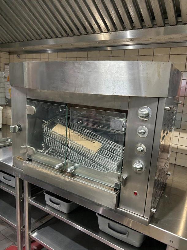 Rotisol USA GF975-2G-SS gas rotisserie, 2 spits, 6 bird capacity, stainless steel, natural gas, tested and working condition.