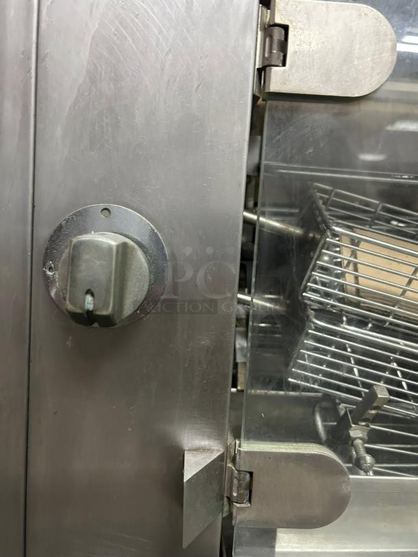 Rotisol USA GF975-2G-SS gas rotisserie, stainless steel, two spits, six-bird capacity, natural gas, tested and working.