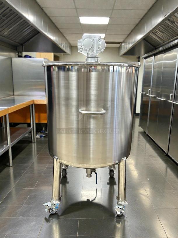 "USA Lab 300L ASME certified mixing solvent tank in like-new condition, stainless steel, with casters and top-mounted motor."