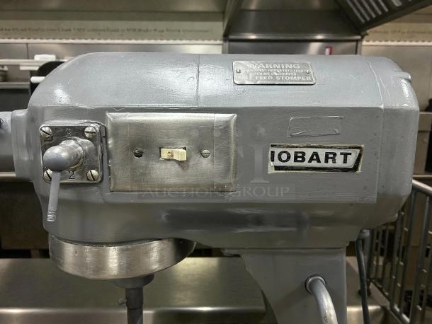 Hobart A200 20 QT dough mixer, 115V single phase, tested and working, visible control lever, and warning label.