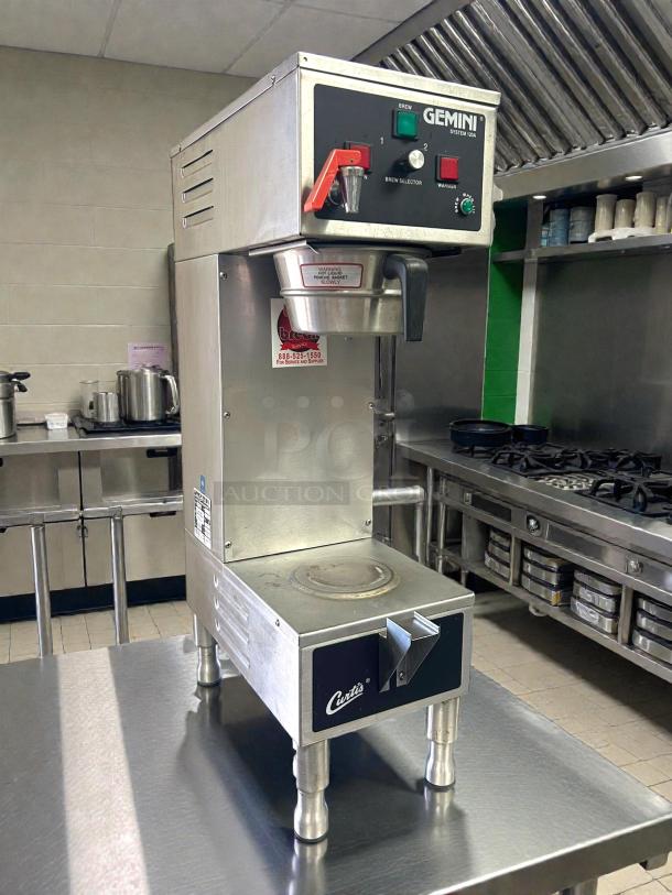 Curtis GEM-120A-63 Automatic Coffee Brewer with lower warmer and hot water faucet. Stainless steel. Tested and working.