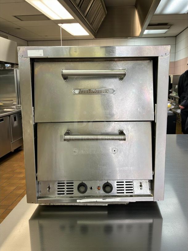 Bakers Pride P-44S electric countertop oven in excellent condition, 208V, 7200W, dual chambers, visible company branding.