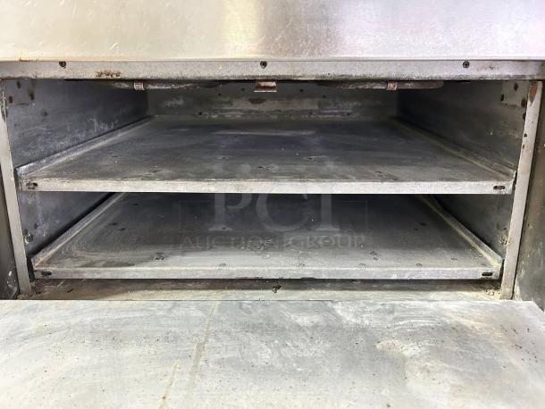 Bakers Pride P-44S electric countertop pizza and pretzel oven, excellent condition, dual baking decks, stainless steel interior.