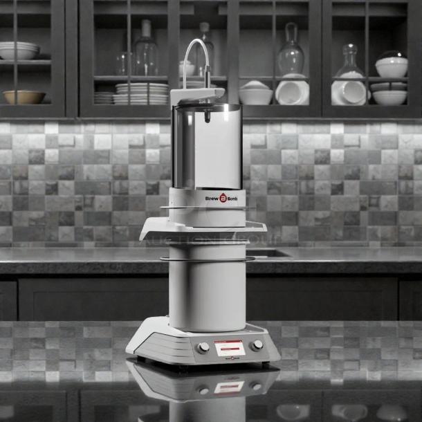 Brew Bomb ACE Brewer Coffee maker on a countertop; tested and working, featuring a modern design with Brew Bomb logo.