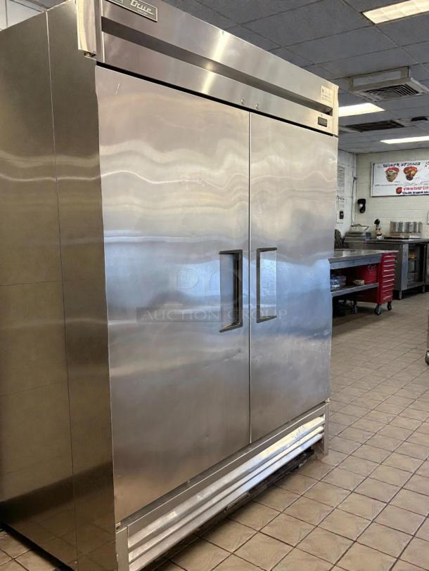 True T-49F-HC reach-in freezer, stainless steel, 54 1/8", excellent condition, two solid doors, tested and working.