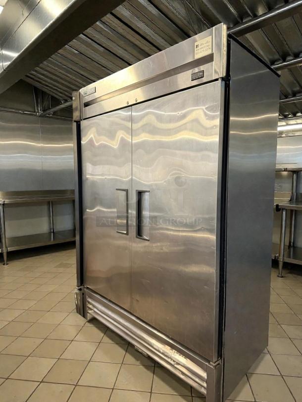True T-49F-HC reach-in freezer with two solid doors, 54 1/8", excellent condition, 115v, tested and working.