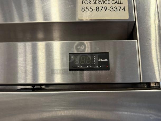 True T-49F-HC reach-in freezer, dual solid doors, stainless steel, digital display, excellent condition, tested working.