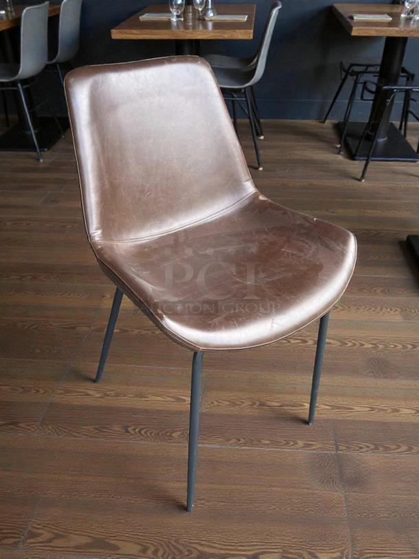 Zuo Modern Mid-Century Modern sled guest chair, faux leather, brown, in great condition, sleek metal legs.