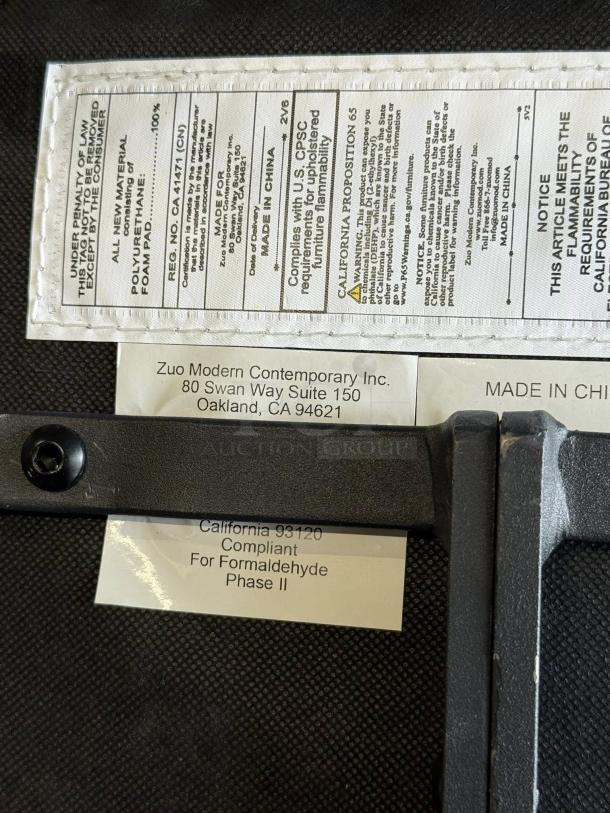 Zuo Modern Cedric faux leather sled guest chair tag shows compliance info; great condition; mid-century modern design.