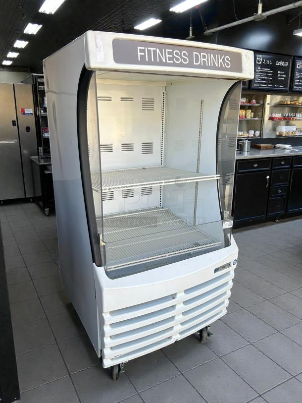 Beverage-Air BZ13HC-W 30" vertical open air cooler with three levels, great condition, tested and working, "Fitness Drinks" label.