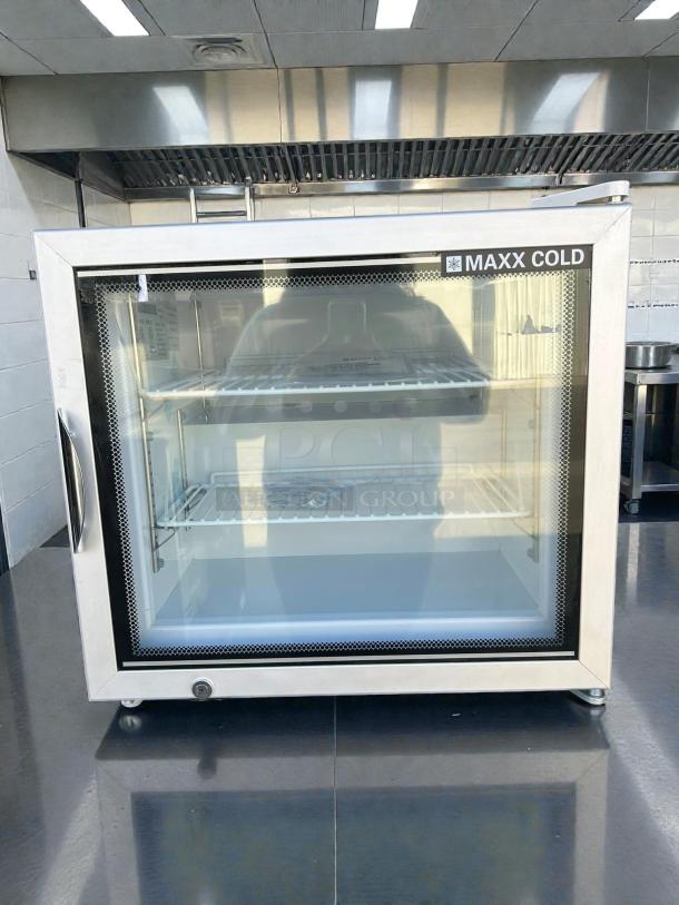 Maxx Cold MXM1-2FHC countertop glass door merchandiser freezer in excellent condition, tested and working.